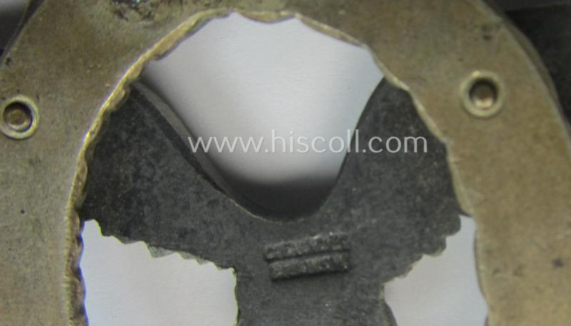 Early- (ie. pre-) war-period- and/or: 'Buntmetall'- (ie. 'Tombak'-) based: WH (Luftwaffe) 'Flugzeugführerabzeichen' (or: pilots-badge) being a maker- (ie. 'C.E. Juncker'-) marked example of the 'J2'-pattern