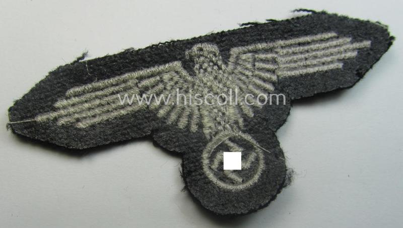 Mid- (ie. later-war-) pattern, 'SS' (ie. 'Waffen-SS') so-called: 'RzM-style' enlisted-mens'-/ie. NCO-pattern arm-eagle as was intended for usage by the various Waffen-SS troops throughout the war