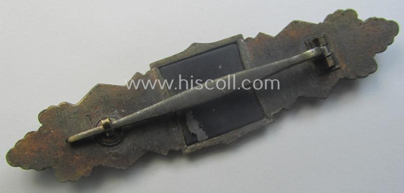 'Nahkampfspange in Bronze' (or: bronze-class close-combat clasp ie. CCC) being a maker- (ie. 'F.&B.-L.'-) marked- and/or minimally converse-shaped specimen as was produced by the maker- (ie. 'Hersteller') 'Funcke u. Brüninghaus'