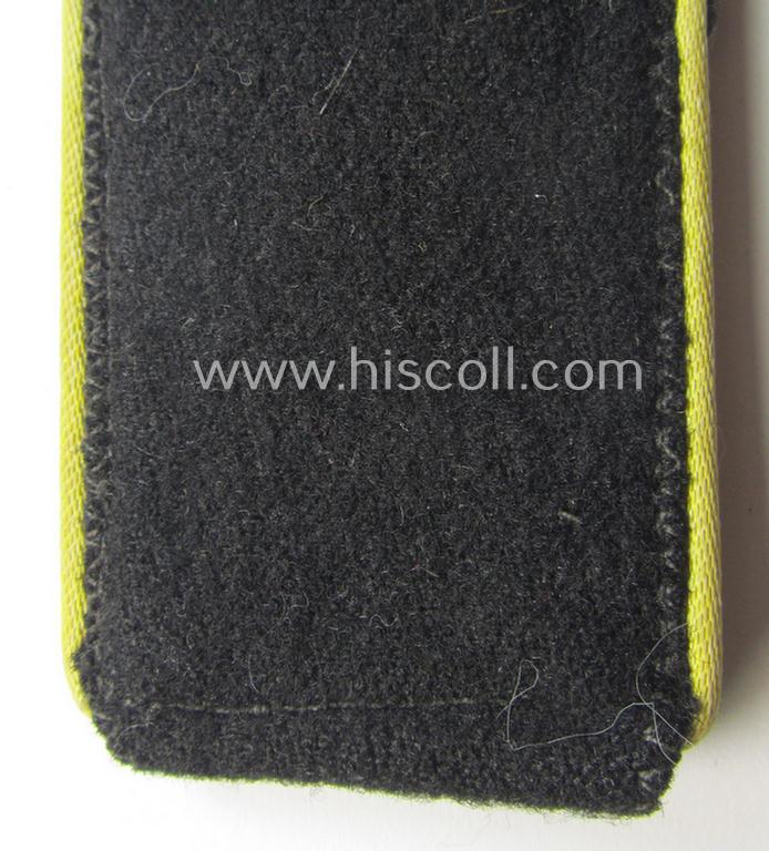 Attractive - albeit regrettably single! - Waffen-SS, EM-type shoulderstrap as piped in the bright-yellow-coloured branchcolour as was intended for usage by an: 'SS-Mann' who served within the: 'SS-Nachrichten-Truppen'