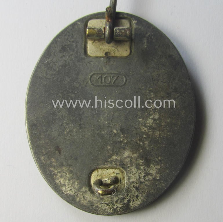 Silver-class woundbadge (or: 'Verwundeten Abzeichen in Silber') being a nicely maker- (ie. '107'-) marked example (as was produced by the desirable 'Hersteller' ie. maker: 'Carl Wild')