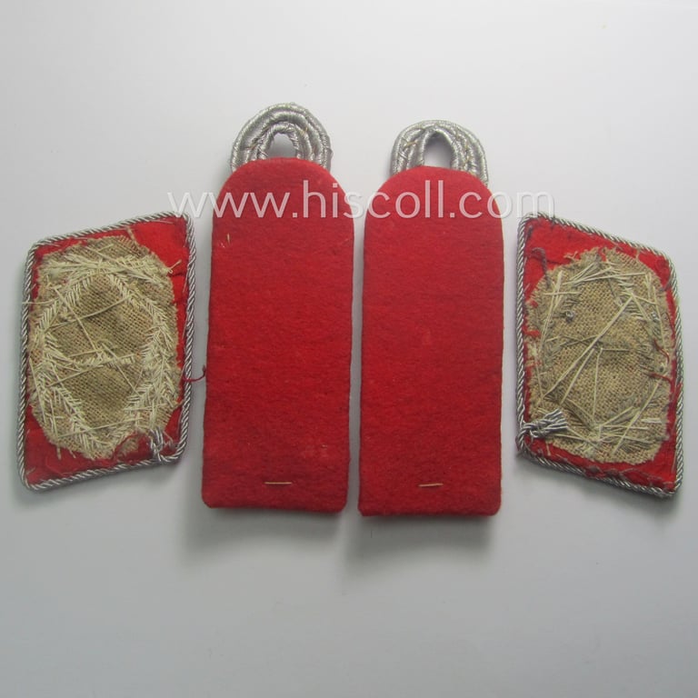 Truly used- and/or worn, 4-pieced WH (LW) insignia-set comprising of a pair of hand-embroidered, WH (Luftwaffe) officers'-type collar-patches and dito shoulderboards: 'Major der Flak-Artillerie-Trpn.'