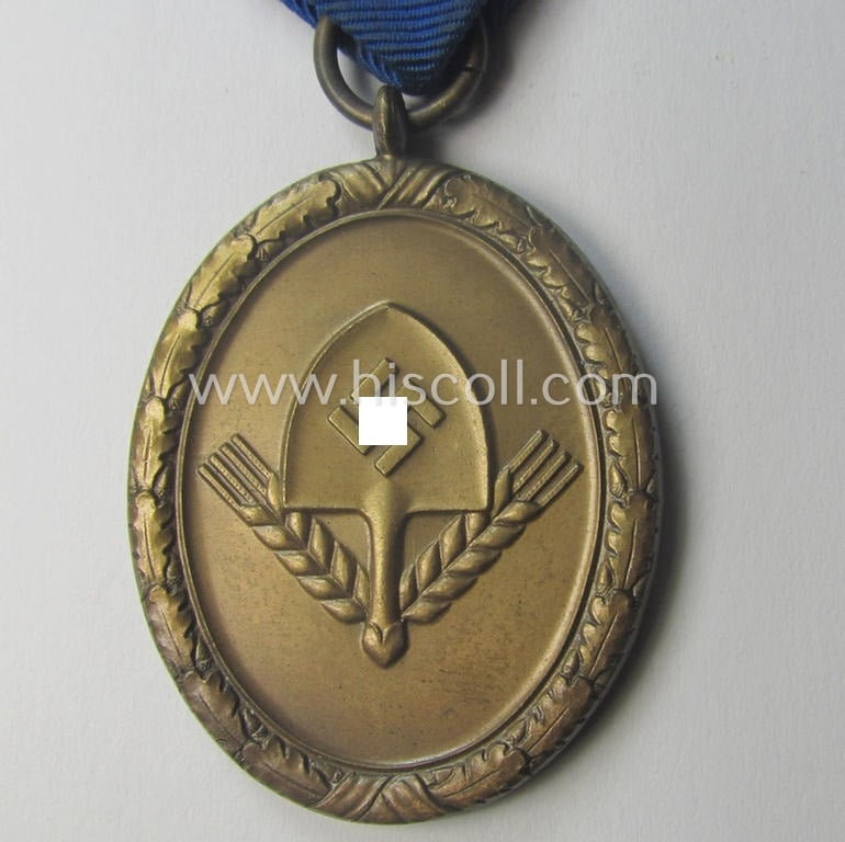 RAD (ie. 'Reichsarbeitsdienst'): 'Dienstauszeichnung 4. Stufe für Männer' as was intended for 4 years loyal-service and that comes mounted onto its period (broad-sized) ribbon (ie. 'Bandabschnitt')