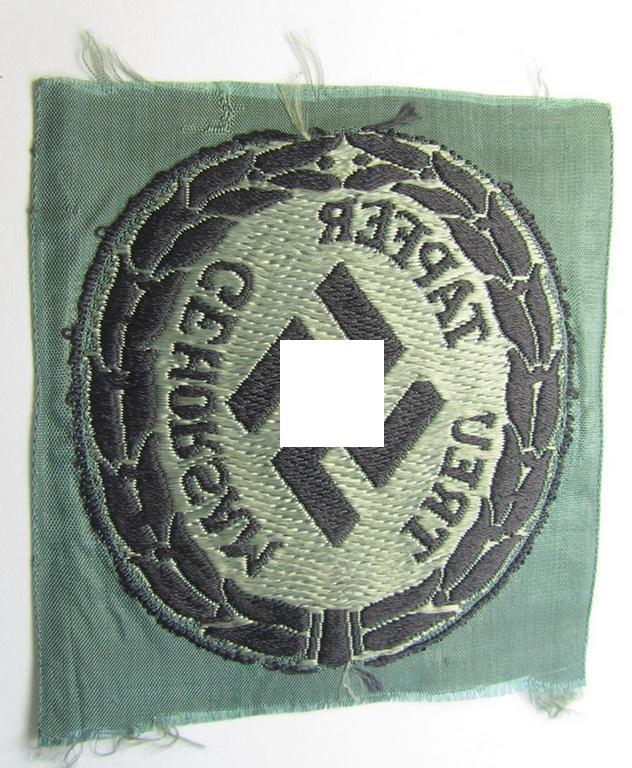 Attractive - and actually scarcely encountered! - (I deem) EM- (ie. NCO-) type, so-called: 'Schutzmannschaften' (or: 'Schuma') armshield as executed in greyish-coloured thread on a black-coloured- (ie. 'Polizei'-related-) background