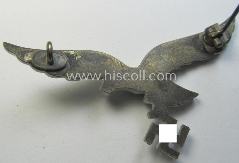Attractive - and scarcely found! - WH (Luftwaffe) aluminium-based breast-eagle as was specifically intended for usage on the white summer-tunics (ie. 'Brustadler für Sommerrock') being a detailed- albeit non-maker-marked specimen