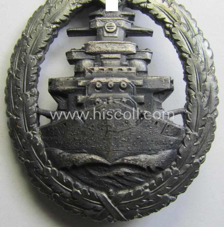 WH (KM) 'Flottenkriegsabzeichen' (or: high-sea fleet badge) being a typical zinc- (ie. 'Feinzink'-) based and/or (I deem) later-war-period version that is neatly maker- (ie. 'Fec. Adolf Bock' ) marked on its back