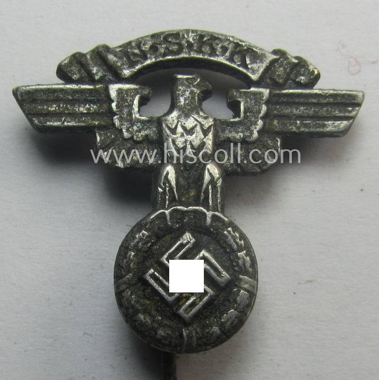 Greyish-silver-toned - and 'aluminium-based - lapel-pin (ie. 'Zivilabzeichen') to be worn on the civil attire as was intended for usage by the various staff-members of the N.S.K.K. (ie. 'National Socialistisches Kraftfahr Korps')