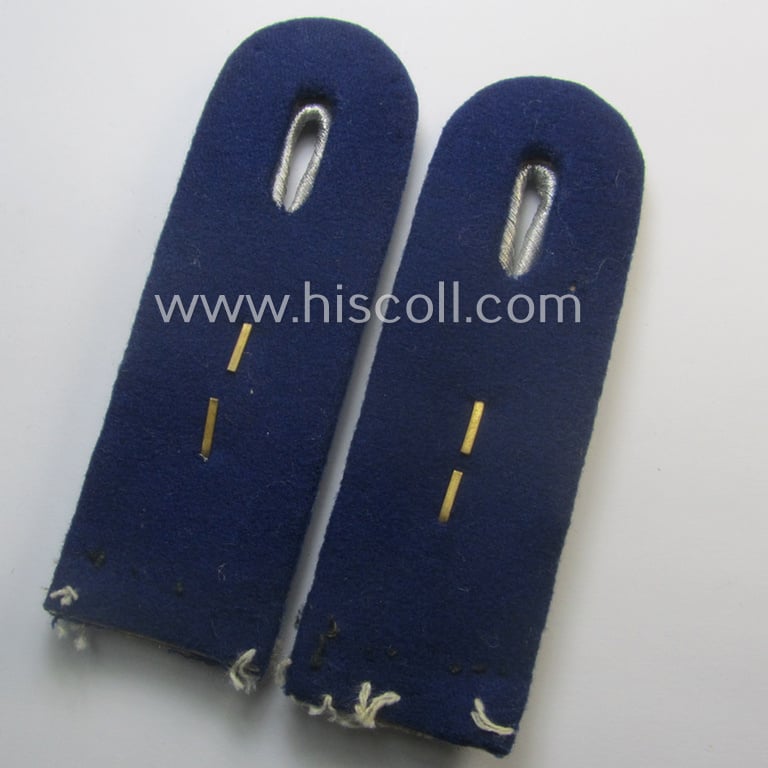Pair of neatly 'cyphered', WH (Luftwaffe) officers'-pattern shoulderboards as piped in the darker-blue-toned branchcolour as was specifically intended for a: 'Leutnant der Reserve u. Arzt einer Sanitäts-Abtlgs.'