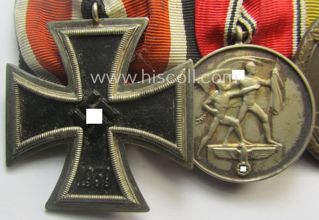 3-pieced, WWII- (ie. TR-) period medal-bar (ie. 'Ordenspange') showing resp. an: 'EKII.Kl.', an Austrian 'Anschluss'-medal '13. März 1938' and a: 'Westwall'-medal