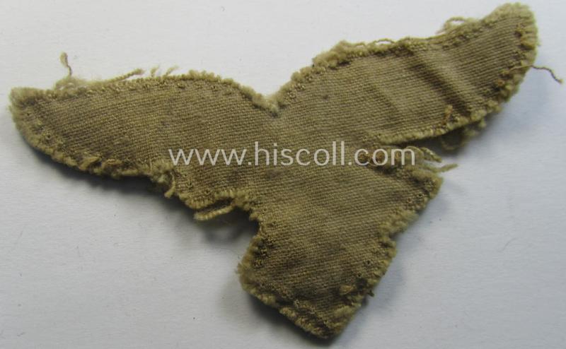 Clearly used - and actually very scarcely found! - WH (Luftwaffe) 'tropical'-issued- (ie. DAK or 'Deutsches Afrika Korps'-related) EM- ie. NCO-type breasteagle as was specifically intended for usage on the tropical-tunics