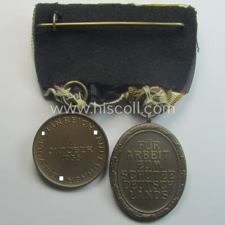 WH (Heeres, LW etc.) medal-bar (ie.: 'Doppelspange') resp. showing a: 'Westwall'-medal and a Czech 'Anschluss'-medal: '1 Oktober 1938'