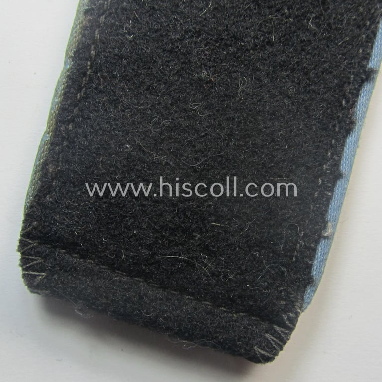 Attractive - albeit regrettably single! - Waffen-SS, EM-type shoulderstrap as piped in the bright-blue-coloured branchcolour as was intended for usage by an: 'SS-Mann' who served within the: 'SS-Nachschub-Trpn.'