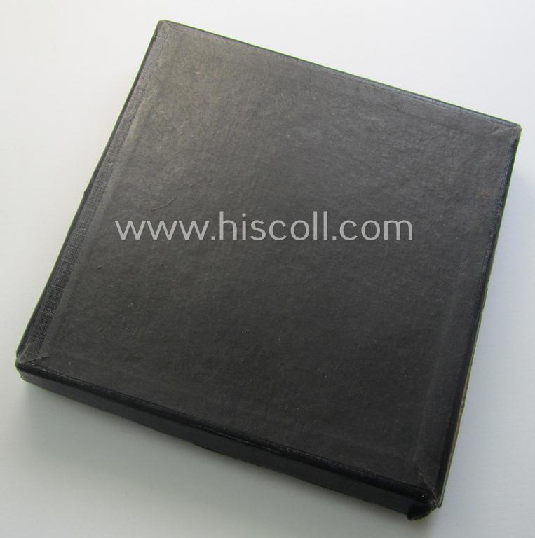 Regrettably damaged, earthenware (ie. 'Allach'-produced!): 'SS-Siegerplakette' as was issued during the: 'Sommer Sonnenwendwettkämpfen der SS' held in 1939 and that comes stored in its period, carton-based box as issued