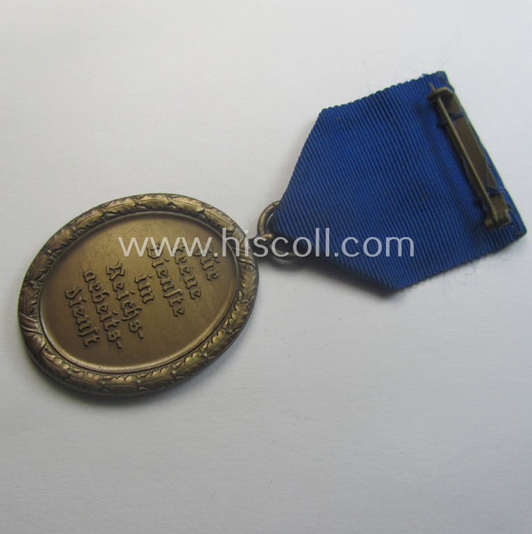 RAD (ie. 'Reichsarbeitsdienst'): 'Dienstauszeichnung 4. Stufe für Männer' as was intended for 4 years loyal-service and that comes mounted onto its period (broad-sized) ribbon (ie. 'Bandabschnitt')