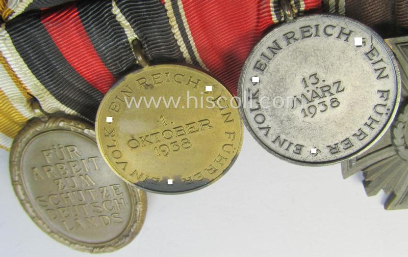 6-pieced N.S.D.A.P.-related 'Ordenspange' showing a: 'KvK II.Kl. m. S.', a: D.A. in Silber' (ie. '2. Stf. für 15 Jahre t.D.'), a: 'D.A. in Bronze' (ie. '3. Stf. für 10 Jahre t.D.') two 'Anschluss'-medals and a: 'Westwall'-medal
