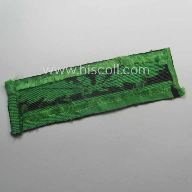 Attractive - clearly used albeit regrettably single! - officers'-pattern, WH (Heeres o. Waffen-SS) rank-insignia-bar (for usage on the camouflaged-uniforms) as used by a junior-officer holding the rank of: 'leutnant' (ie.: 'SS-Untersturmführer')