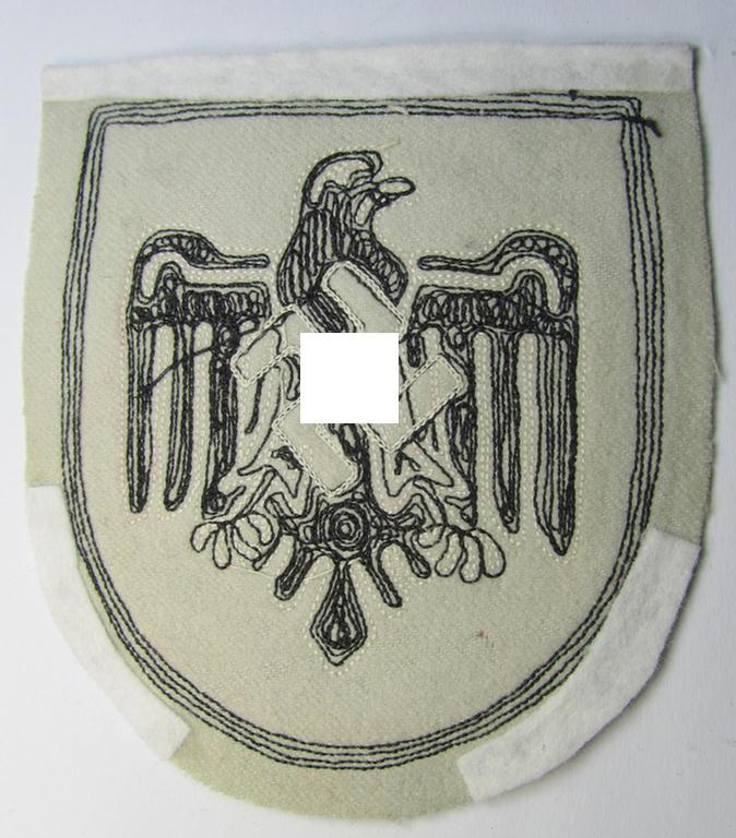 Attractive example of a neatly embroidered NSRL- (ie. 'NS Reichsbund für Leibesübungen'-related sports'-tunic-patch as was specifically intended for usage on the various shirts and/or tunics during the Berlin Olympic Games held in 1936