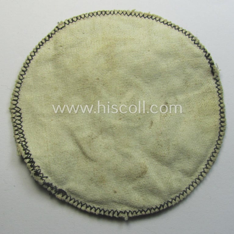 Unusual - and actually never before seen! - 'DAF' (ie. 'Deutsches Arbeitsfront o. Werkschar'-) related breast-badge as executed in 'BeVo'-weave pattern that shows the interwoven DAF 'Zahnrad'-symbol and text: 'Werk Neuwied'