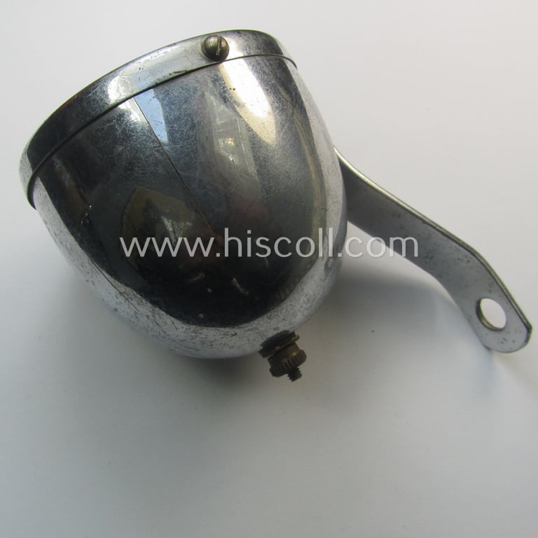 Very unusual - and never before seen! - TR-era 'Nazi-Kitsch'-item: a chromed-metal-based bicycle- (or: motor-cycle-) tail-light showing a white swastika onto a red-coloured and semi-transparant background