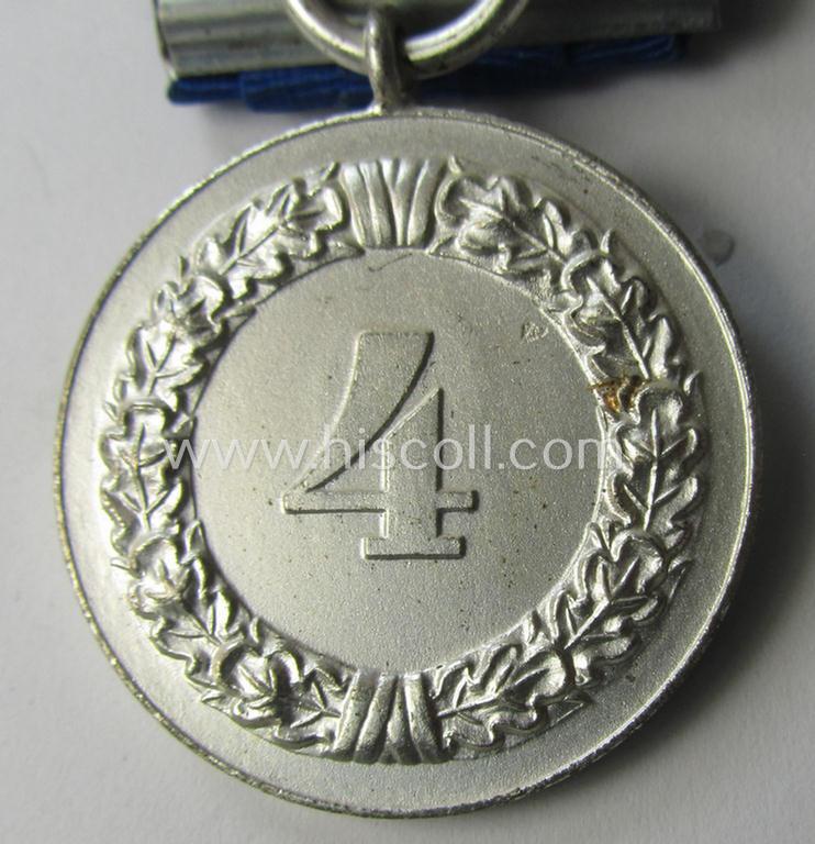 Attractive, silver-toned & detachable WH (Heeres o. KM) so-called: 'Einzelspange' showing a: 'WH-Dienstauszeichnung 4. Stufe' (as was intended for 4 years of loyal-service) and that shows a detailed, Heeres o. KM-type-eagle-device, period-attache...