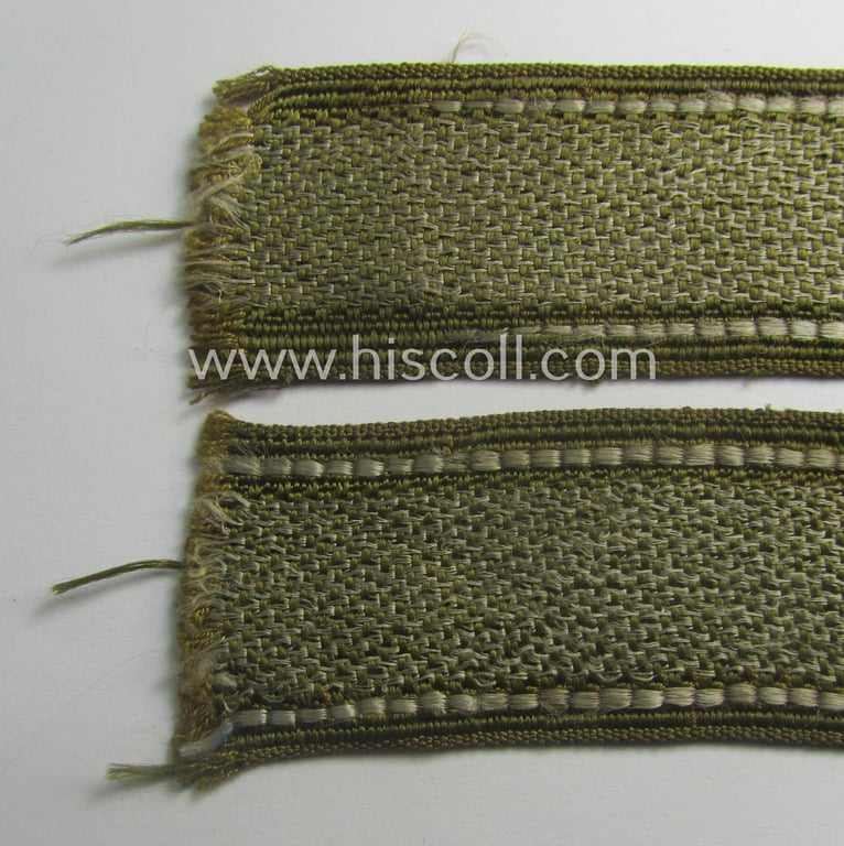 Truly used- and/or tunic-removed - almost full length and scarcely encountered! - WH (Heeres) 'BeVo'-woven: 'FHH-Ärmelstreifen' (ie. cuff-title) as was intended for the soldiers- (ie. NCOs) serving within the: '60. Pz-Gren.-Div. “Feldherrnhalle”