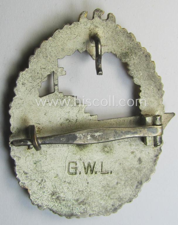 WH (Kriegsmarine) 'Zerstörerkriegsabzeichen' being a maker-marked example as executed in 'Buntmetall' (ie. 'Tombak') as was produced by the desirable maker (ie. 'Hersteller'): 'GWL' (ie. 'Gebr. Wegerhoff')