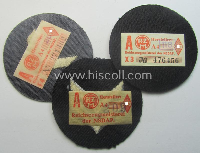 Interesting - and hardly ie. even never used! - 3-pieced, DJ- (ie. 'Deutsches Jungvolk in der HJ') insignia-set comprising of three darker-blue-toned rank-patches (ie. 'Rangzeichen') all three still holding their period-attached 'RzM'-etikets