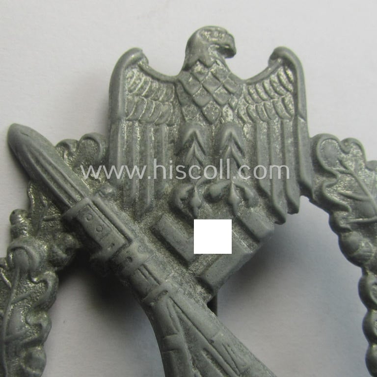Incomplete 'Infanterie Sturmabzeichen in Silber', being an unmarked (and/or converse- ie. vaulted) 'hollow-back' example by the maker: 'Friedrich Linden' (ie. 'F.L.L.') as was executed in silver-coloured, zinc-based metal (ie. 'Feinzink')