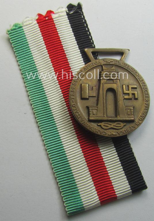 Stonemint medal-set: 'Deutsch-Italienische Feldzugsmedaille' (or: German-Italian campaign-medal) being a maker- (ie. 'Lorioli - Milano'-) marked specimen that comes as issued