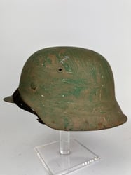 Untouched m42 Camo Helmet.