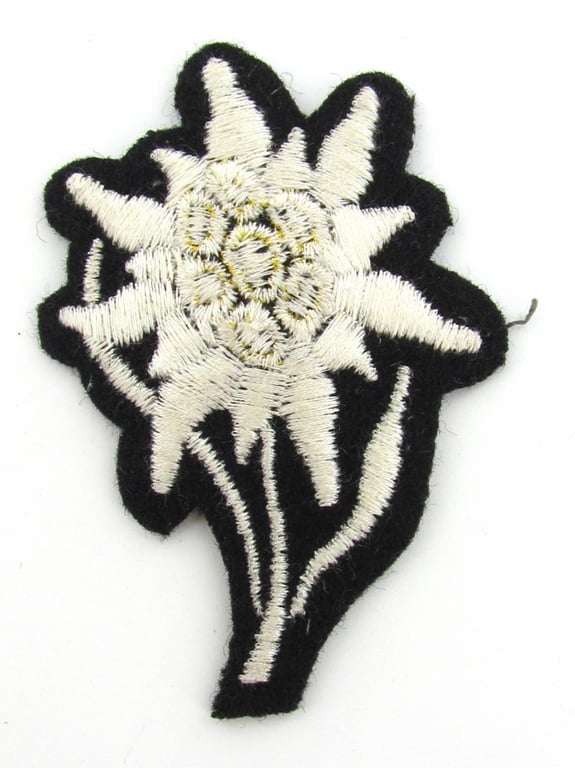Waffen SS 'Gebirgsjäger' Edelweiss cloth cap badge