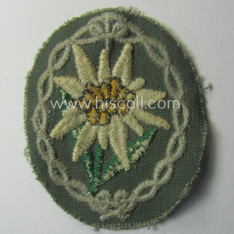 'Variant'-pattern, WH (Heeres) 'Gebirgsjäger'- (ie. mountain-troopers-) related arm-badge, being a desirable example as was executed in the machine-woven pattern on a thin-shaped and/or field-grey-toned background