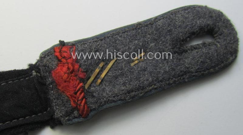 Attractive - albeit regrettably single! - WH (Luftwaffe ie. Hitlerjugend-) related- and unusally 'cyphered', so-called: 'Flakhelfer'-shoulderstrap as was intended a: 'Flakhelfer' (ie. later-war-period, youthful, anti-aircraft staff-member)