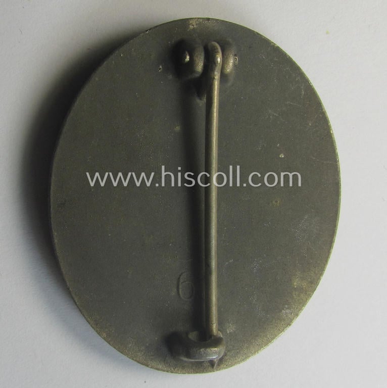 Moderately used- and/or worn 'Verwundeten-Abzeichen in Silber' being a typical maker- (ie. '65'-) marked- and/or: 'Feinzink'-based example by the maker: 'Klein & Quenzer'