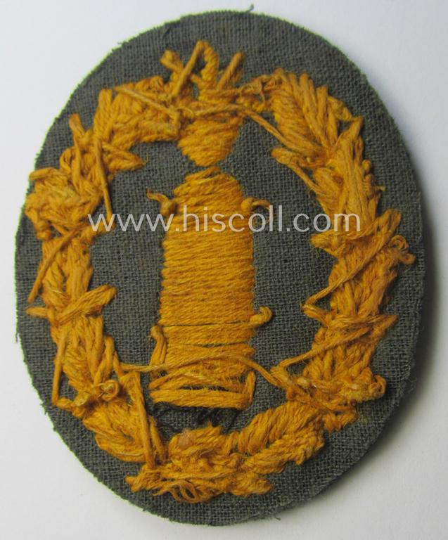 Luxuriously-styled, neatlty hand-embroidered WH (Heeres) 'Richtabzeichen für Artillerie-Richtkannoniere' (or: artillery gun-layers patch)