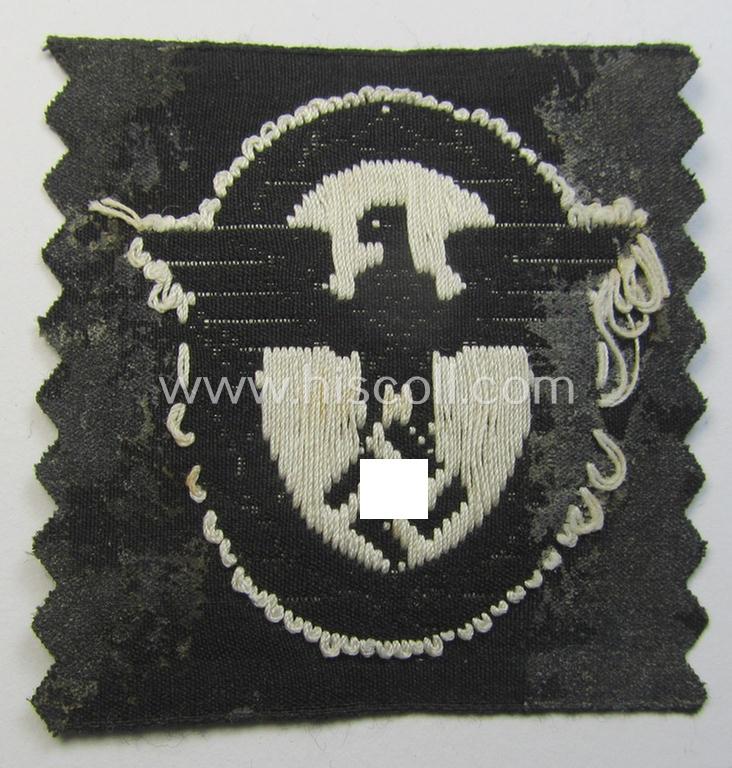 Attractive, EM/NCO-pattern, police- (ie. 'Polizei-') related cap-eagle (ie. 'Adler für Schiffchen o. Einheitsfeldmütze') being a 'virtually mint- ie. unissued' example as executed in 'BeVo'-weave-style onto a black-coloured background