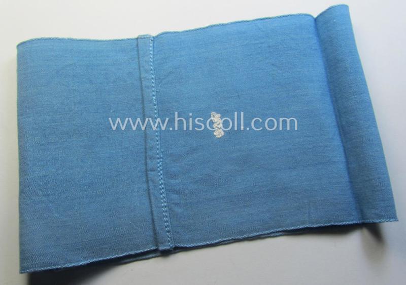 Light-blue-coloured and neatly 'BeVo'-woven, so-called: RLB (or: 'Reichsluftschutzbund') 'Amtsträger'-armband depicting the typical 'RLB'-logo (without lettering) and showing an interwoven makers'-designation (ie. '34'-numeral)