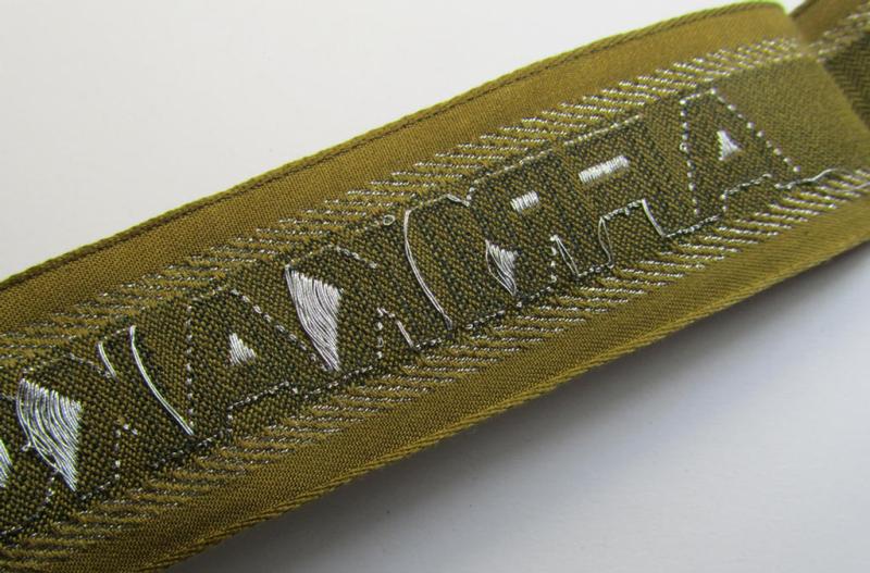 Superb, 'BeVo'-like cuff-title (ie. 'Ärmelstreifen') entitled: 'Afrikakorps' being a presumably issued but never worn example that comes in an overall very nice- (ie. non-shortened- and never tunic-attached-), condition