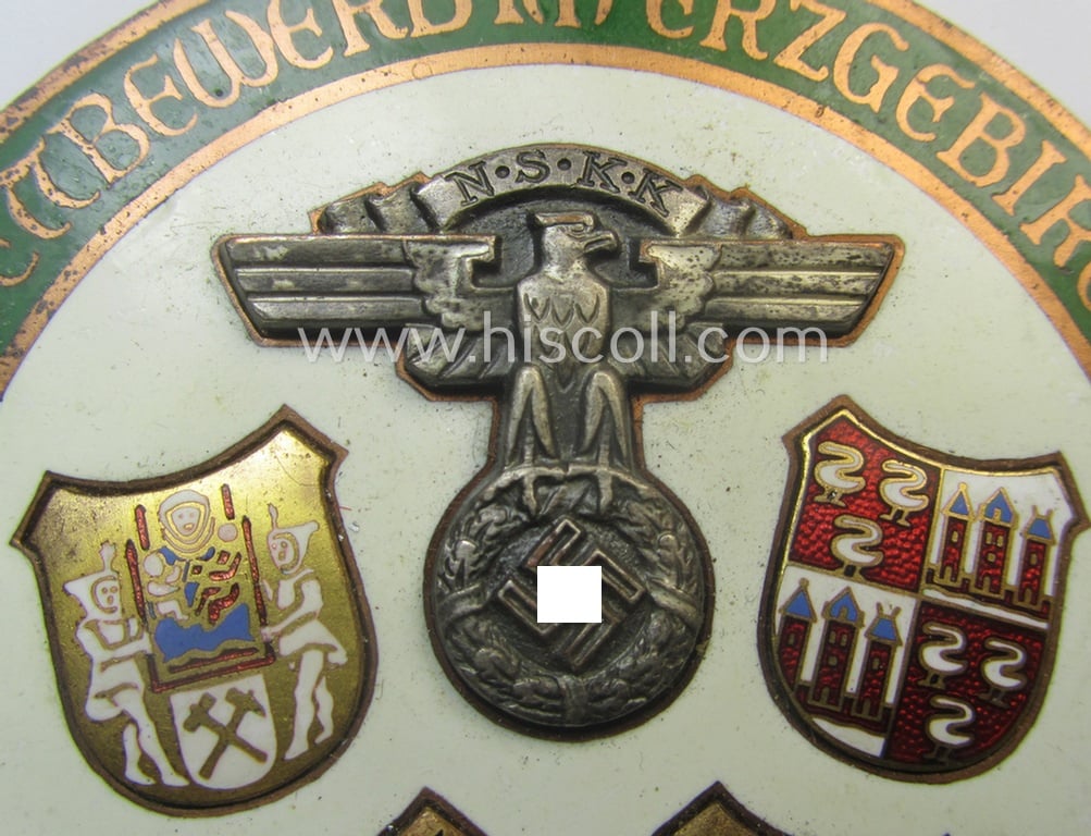 Commemorative, enamelled N.S.K.K.-related plaque (ie. 'Erinnerungs- o. nichttragbare Teilnehmer-plakette') showing a detailed N.S.K.K.-eagle-device, 4 provincial shields and text: 'Motorbrigade Sachsen - Geländewettbewerb im Erzgebirge - 3.5.1936'
