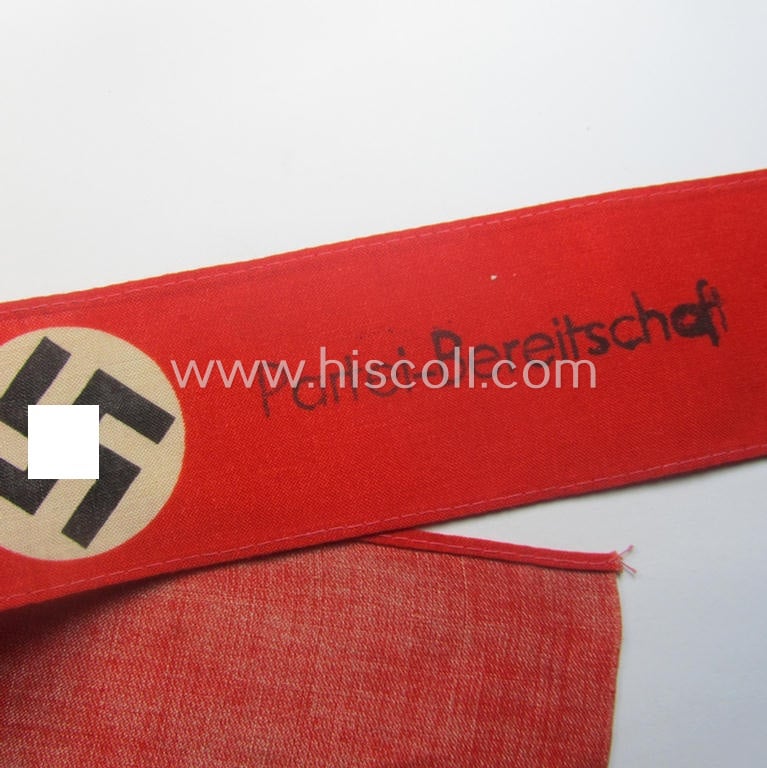 Unusually encountered - and most certainly scarcely seen! - thin-shaped, 'N.S.D.A.P.'-related armband (ie. 'Armbinde') being of the 'entirely printed'-type showing a swastika and text: 'NSDAP - Partei-Bereitschaft'