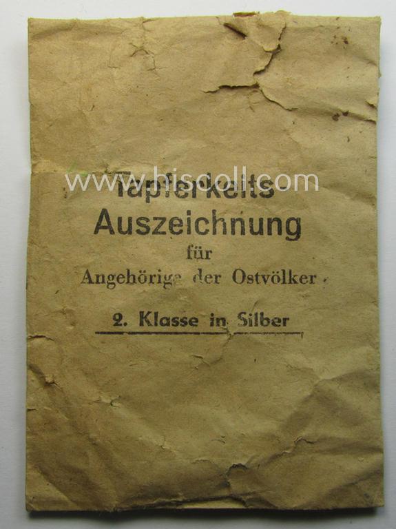 WH-related 'Tapferkeitsauszeichnung für Angehörige der Ostvölker, 2. Kl. in Silber mit Schwn.' (being a 'Feinzink'-based example that comes stored in its period pouch)