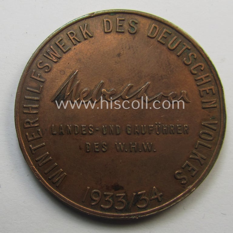 WHW-related supporter plaque (ie. 'Erinnerungs- o. nichttragbare Auszeichnungsplakette') that shows a portrait of the: 'Reichskanzler' Adolf Hitler surrounded by the text: 'Hitlers Dank - Gau Halle-Merseburg - 1933-34'