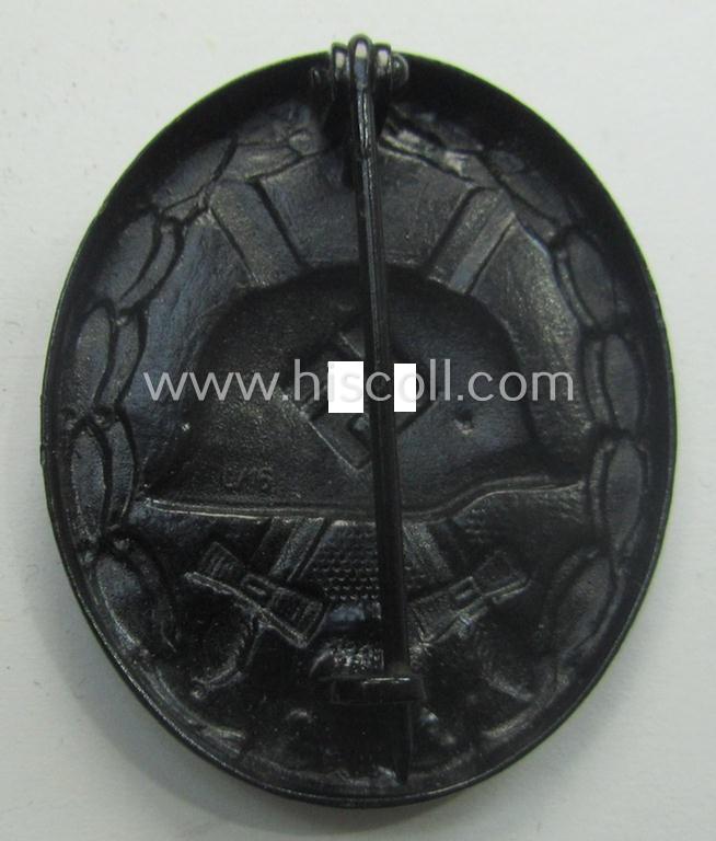 'Verwundeten-Abzeichen in Schwarz' being a maker- (ie. 'L/16'-) marked example by the: 'Steinhauer & Lück'-company that came stored in its (scarcely seen!) period pouch