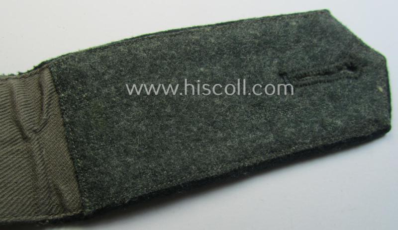 Single, WH (Heeres) EM-type 'cyphered' shoulderstrap: 'Soldat des Infanterie-Regiments 107'