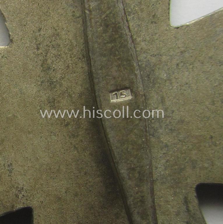 'Eisernes Kreuz 1. Kl.' (or: Iron Cross 1st class) being a typical maker- (ie. '15'-) marked example that as was produced by the Austrian maker (ie. 'Hersteller'): 'Friedrich Orth' and that comes as issued and worn