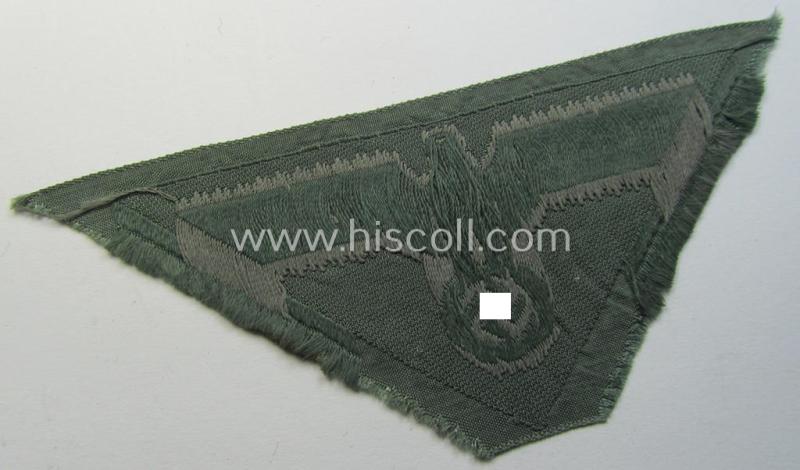 Later-war-period WH (Heeres) so-called: 'M44'-pattern- and/or: trapezoid-shaped breasteagle ie. 'Brustadler für Mannschaften u. Uffz.' (being a field-grey-coloured example that is void of an interwoven 'BeVo-Wuppertal'-makers'-designation)