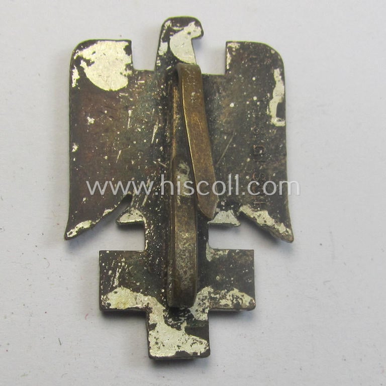 Minimally damaged, larger-sized, multi-coloured- and/or neatly enamelled DRK (ie. 'Deutsches Rotes Kreuz') visor-cap badge (or: 'Mützenabzeichen für Schirmmütze')