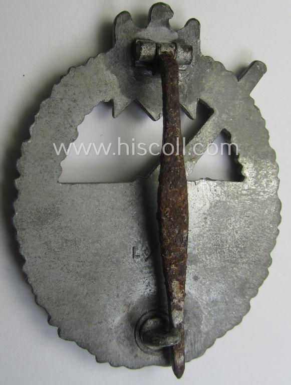 WH (Kriegsmarine) 'Marine-Artillerie-Abzeichen' being a clearly maker- (ie. 'L/56'- thus by: 'Funcke & Brüninghaus'-) marked and/or zinc- (ie. 'Feinzink'-) based example