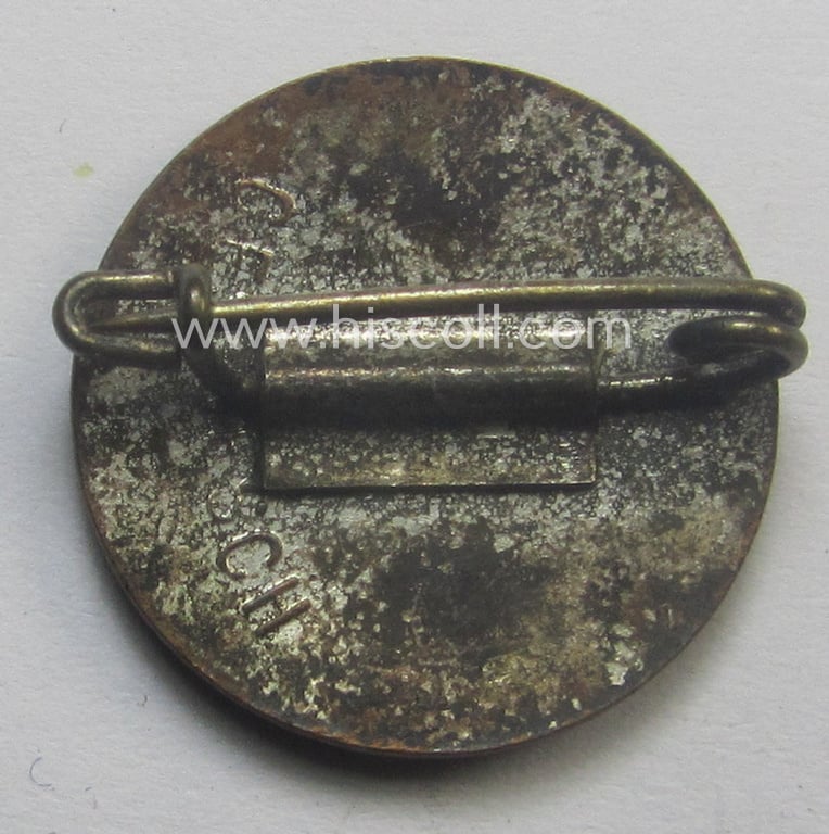 Unusually seen - smaller-sized- and darker-red-coloured! - 'N.S.D.A.P.'-membership-pin- ie. party-badge (or: 'Parteiabzeichen') being a non-maker- marked example that bears a: 'Ges.Gesch.'-patent-pending-designation