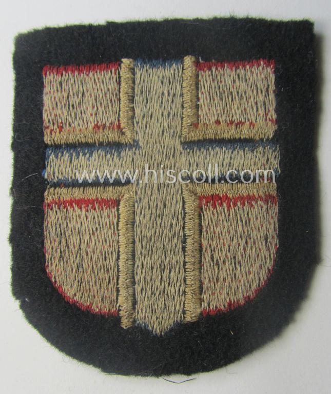 Stunning - and rarely encountered! - Waffen-SS, Norwegian 'volunteer'-armshield as was intended for usage by soldiers of (amongst others) the: '6. Gebirgs-Division der SS' (“Nord”) and that comes in a 'virtually mint- ie. unissued'-, condition